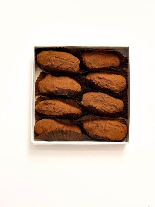 Zwetschgen Truffes Progin Manufacture du Chocolat Nahaufnahme